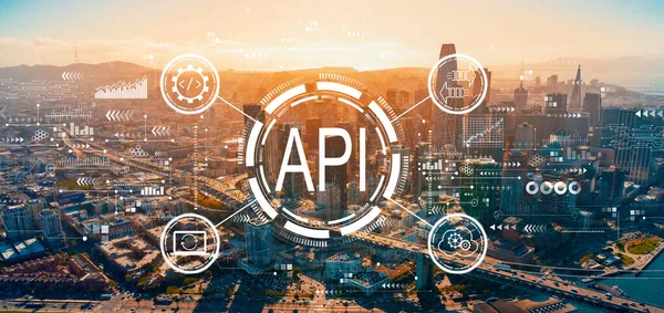 API - concepto de interfaz de programación de aplicaciones con el centro de San Francisco —  Fotos de Stock