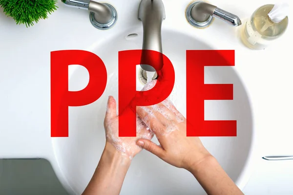 PPE theme with person washing their hands — Stock Photo, Image