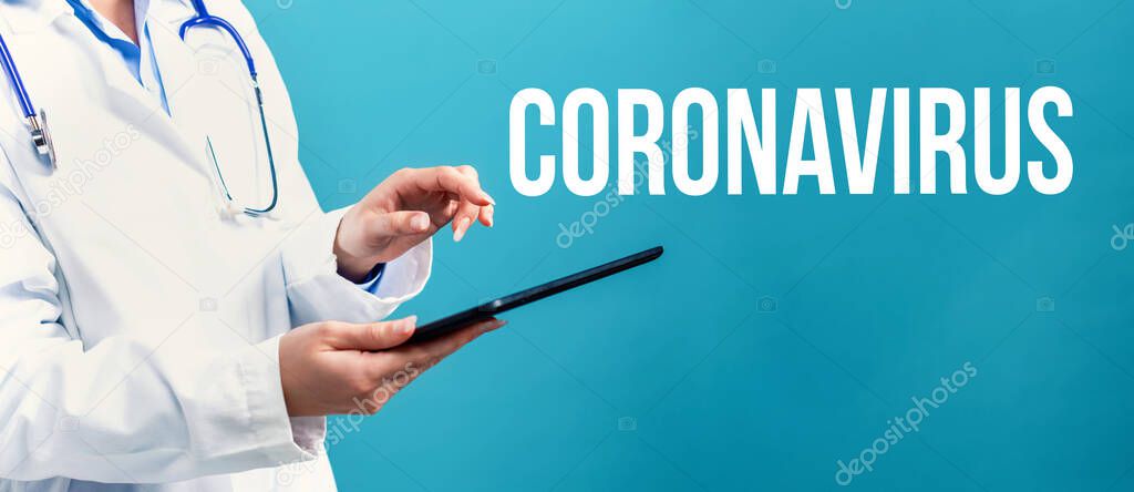 Coronavirus theme with a doctor using a tablet