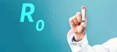 Laboratuvar şişesi tutan bir doktorla R-0 teması