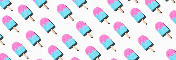 Roze en blauwe ijslolly 's met schaduw — Stockfoto