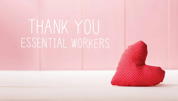 Messaggio Thank You Essential Workers con un cuscino rosso — Foto Stock