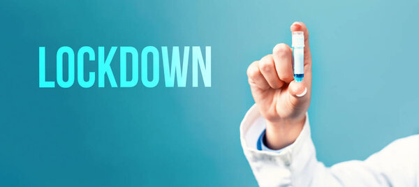 Lockdown theme with a doctor holding a laboratory vial