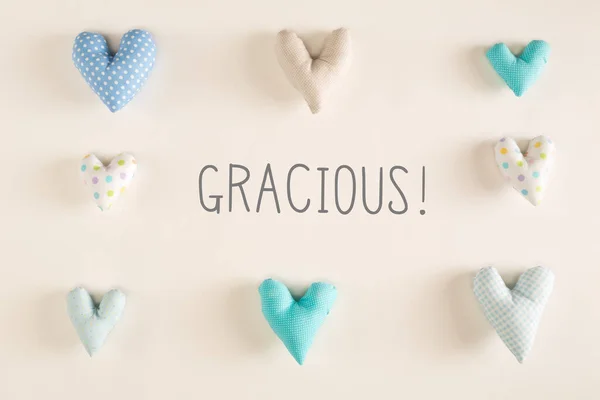 Gracieux - Merci en espagnol avec des coussins de coeur bleus — Photo