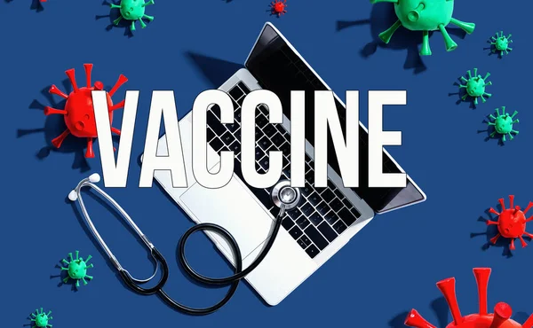 Vaccinera tema med stetoskop och bärbar dator — Stockfoto