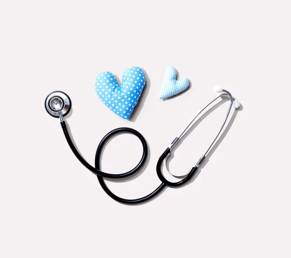 Medical worker appreciation theme with hearts and stethoscope — Stock Photo, Image