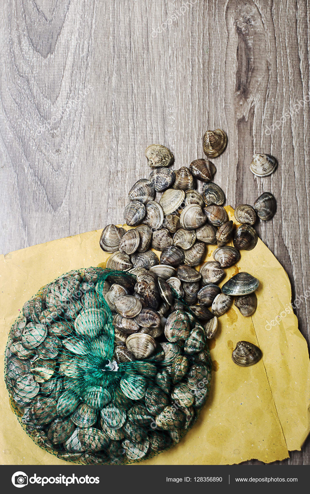 Raw alive clams over wood Stock Photo by ©TTLmedia 128356890