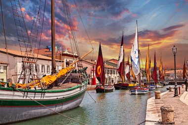 Cesenatico, Emilia Romagna, Italy: view at dawn of the port canal with the ancient wooden sailing boats