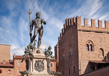 Bologna, Emilia Romagna, Italy: the Renaissence Fountain of Neptune with the bronze statue of the god of water and sea of Roman mythology clipart