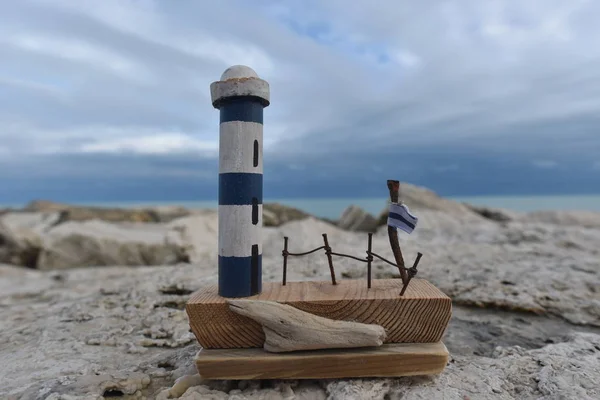 Lighthouse with recycled woods and nails