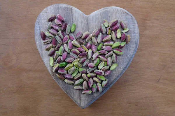 Liefde Pimpernoten Pistaches Artistieke Compositie Bij Het Droog Voedsel Een — Stockfoto