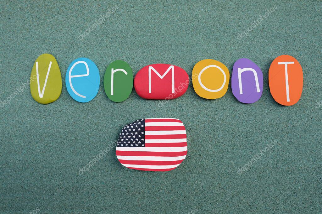 Vermont , U.S. state in the New England region, souvenir with multi colored stone letters over green sand