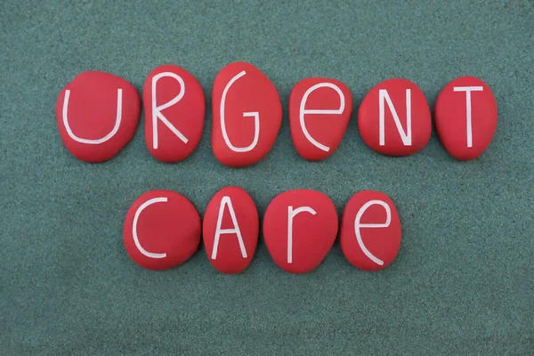 Urgent Care Medical Text Composed Red Colored Carved Stone Letters — Stock Photo, Image