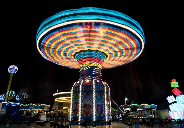 Carousel spinning fast — Stock Photo, Image
