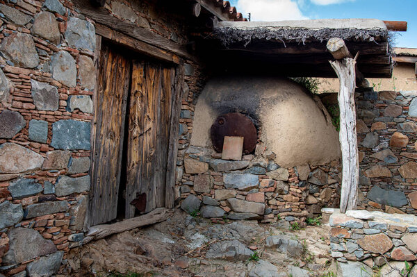 Traditional house exterior courtyard with clay oven at the village of Fikardou in Cyprus