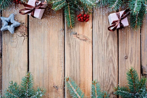 Drewniane tła Christmas prezenty małe pole — Zdjęcie stockowe