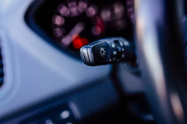 Close up on car lights switch — Stock Photo, Image