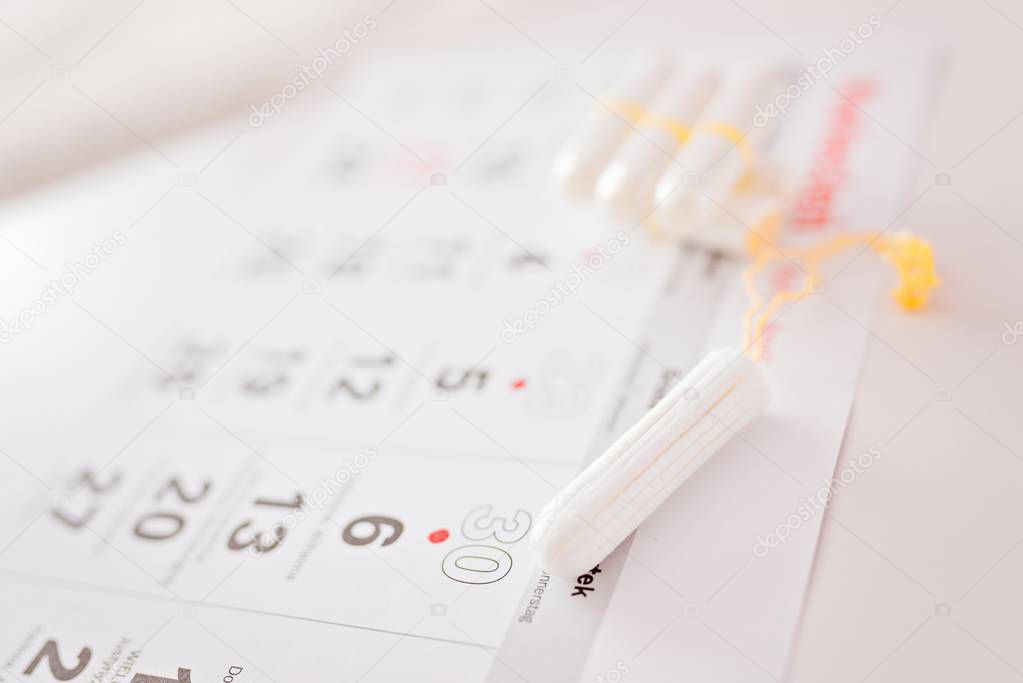 Menstruation calendar and clean cotton tampons