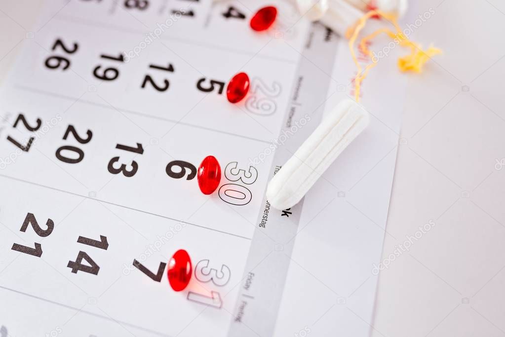 Menstruation calendar and clean cotton tampons