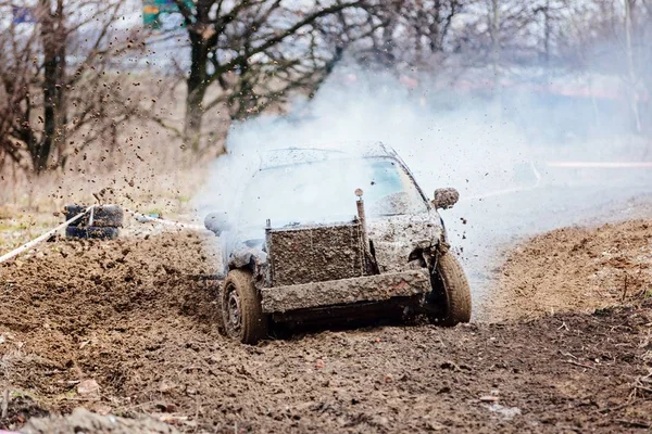 Damaged old car racing with broken engine — Stock Photo, Image