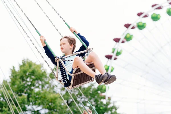 Happy child boy having fun in amusement park. — Stock Photo, Image