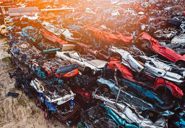 Destroyed scrapped cars stacked on a scrap yard. — Stock Photo, Image