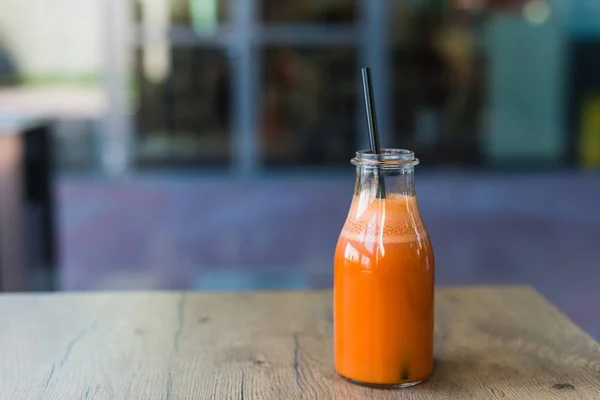 Delicious carrot juice in bottle — Stock Photo, Image