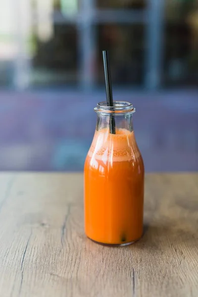 Delicious carrot juice in bottle — Stock Photo, Image