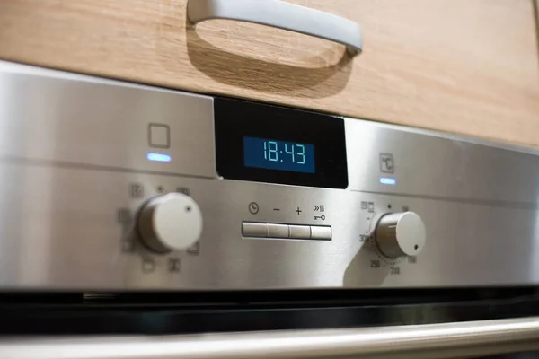 Metal electric kitchen oven control panel — Stock Photo, Image