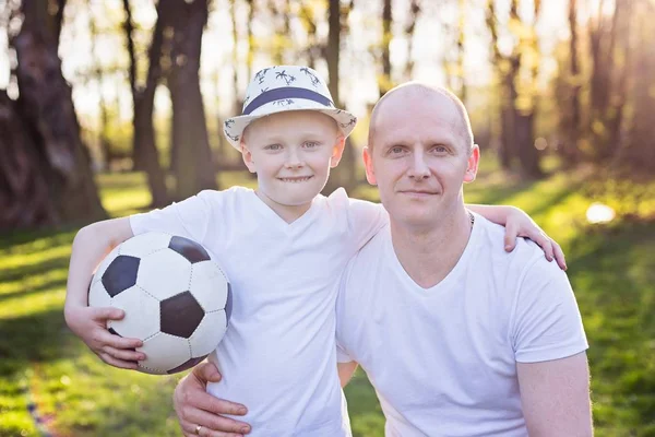 Happy father and son portrait in park — Stock Photo, Image