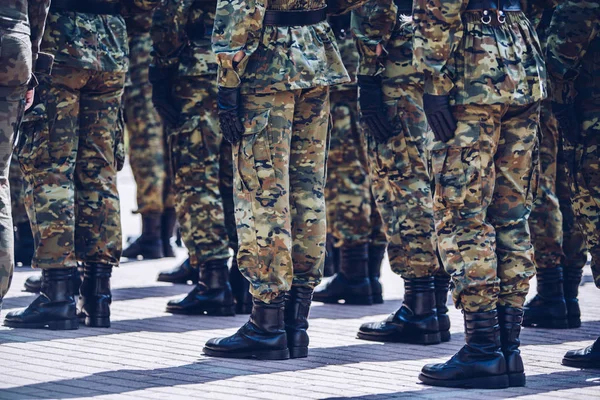 Soldiers in masking camouflage uniforms on parade — Stock Photo, Image