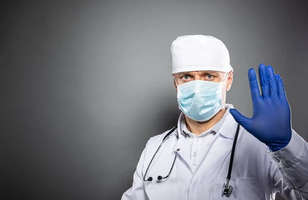Frustrated man doctor showing hand in stop gesture. — Stock Photo, Image