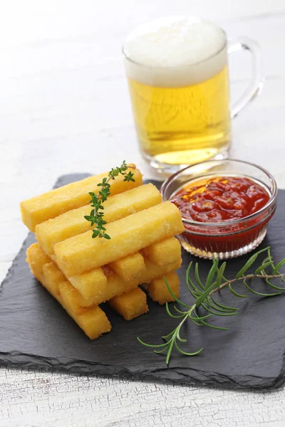 Fried polenta with dipping sauce — Stock Photo, Image