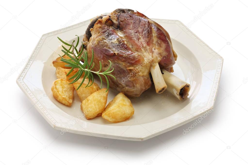 pork shank with roasted potatoes, stinco di maiale con patate arrosto, italian cuisine