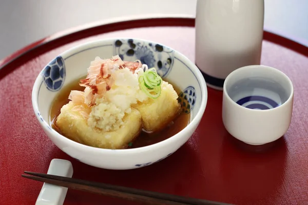 Agedashi tofu and sake, japanese food — Stock Photo, Image