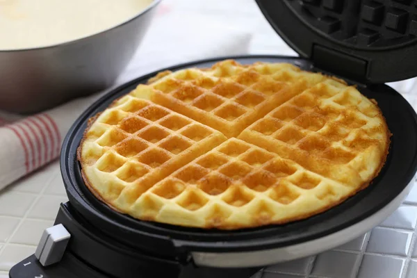 Preparing homemade waffles by waffle maker machine. — Stock Photo, Image