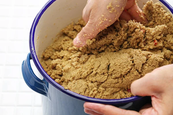 Maintenance of nukadoko(salted rice bran bed for pickles), japanese traditional food cooking — Stock Photo, Image