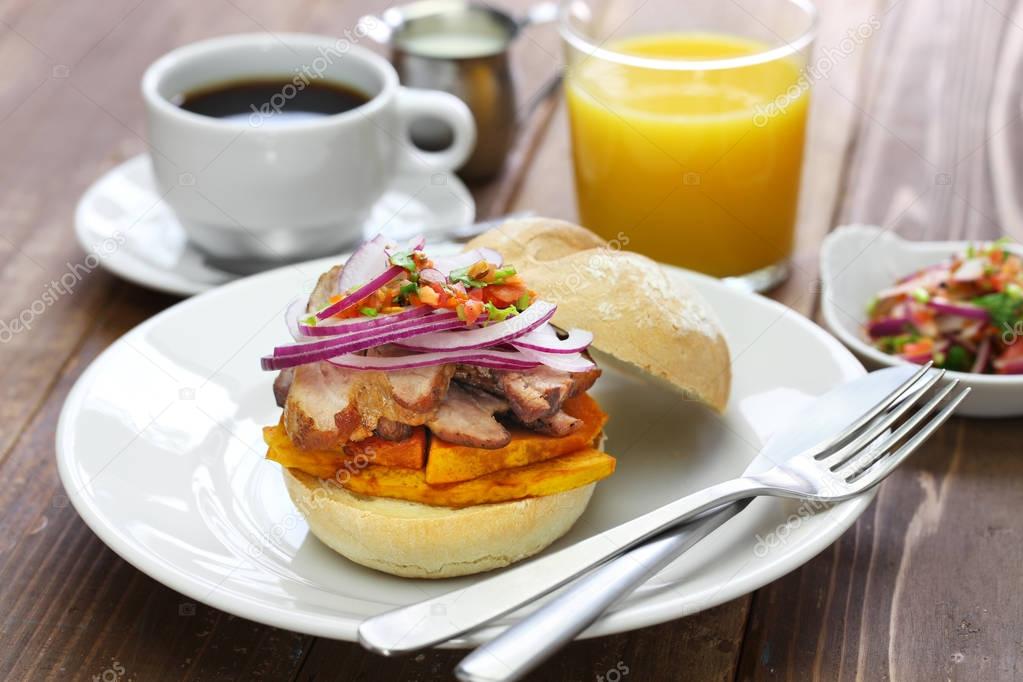 Pan con chicharron, peruvian pork sandwich — Stock Photo