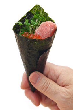 This is hand roll fatty tuna & salmon roe sushi