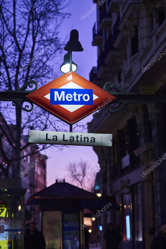 Madrid, Spain - January 10, 2020. La Latina Metro Subway station sign at nightfall. Madrid, Spain.