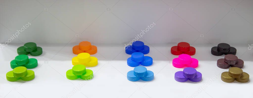 Colourful of bottle caps, Production of plastic products made of PVC polymers