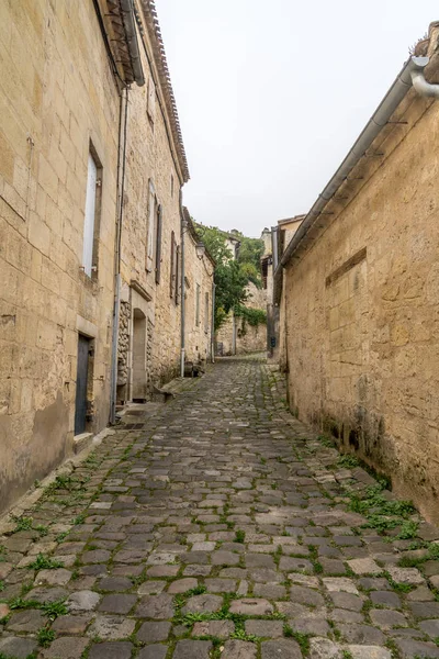 ancient street made of stone named Rue de la Port Saint-Martin,