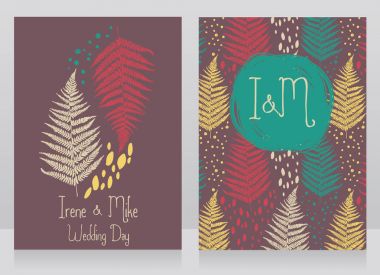 iki kart ile eğreltiotu yaprakları sonbahar düğün için dekore edilmiş