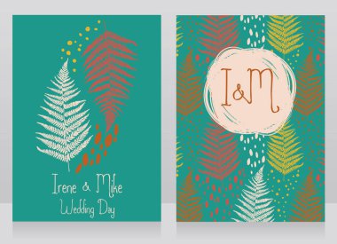 iki kart ile eğreltiotu yaprakları sonbahar düğün için dekore edilmiş