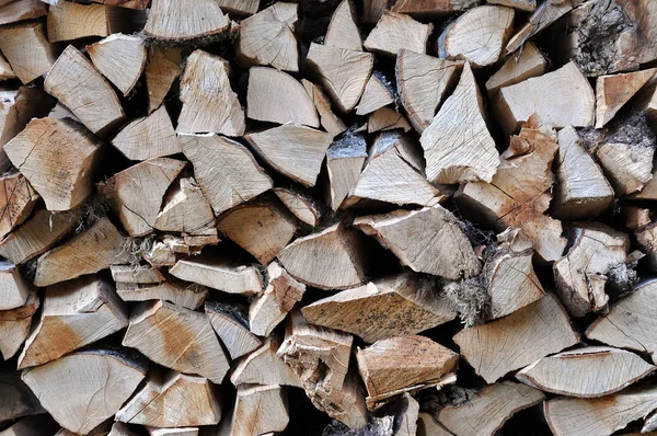 Neatly stacked firewood for winter — Stock Photo, Image