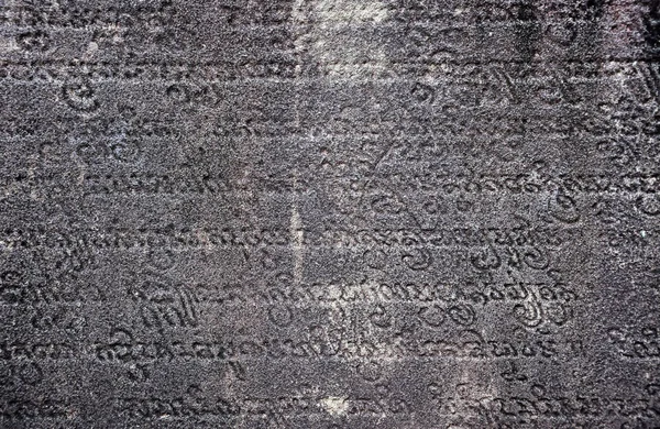 Antika sanskrit text huggna i sten — Stockfoto