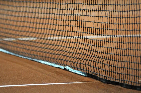 Tennis net and court