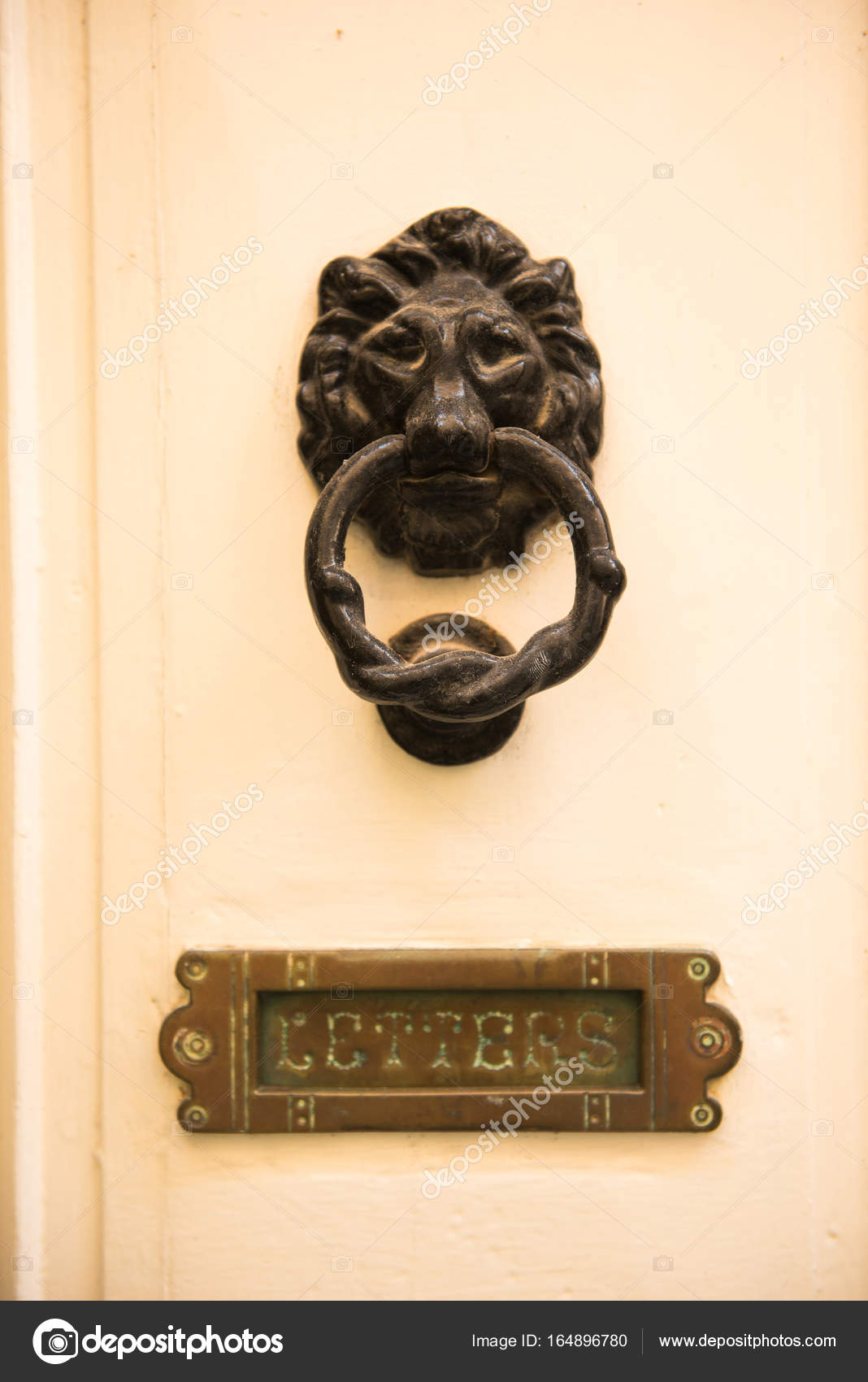 Old Vintage Lion Head Door Knocker And Letterbox Stock Photo