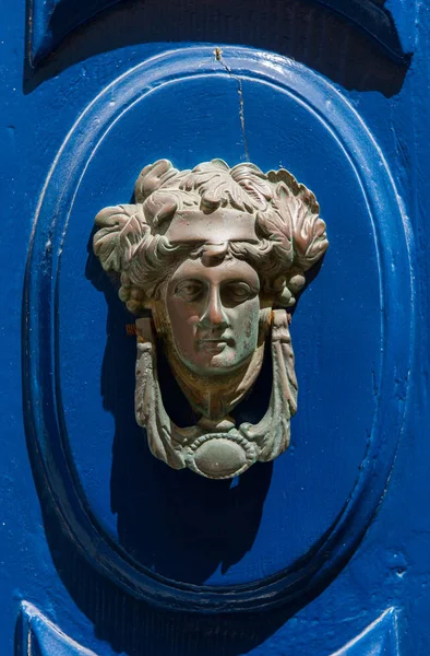 Decorative bronze door handle in the form of a beautiful woman 's — стоковое фото