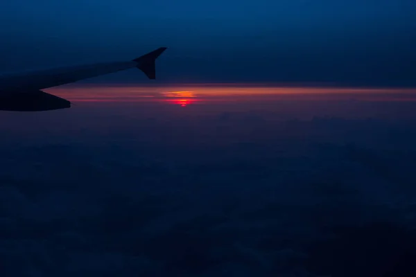 Solnedgången från ett flygplan — Stockfoto